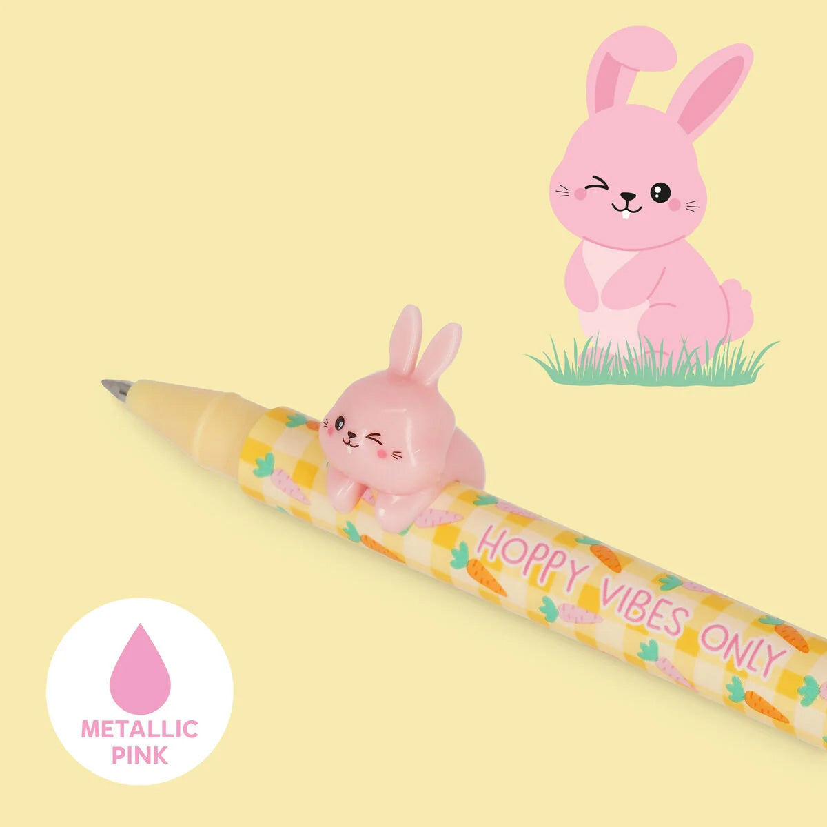Pink bunny-shaped pen with 'Happy Vibes Only' text on a yellow background