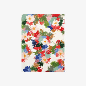 Notebook with colorful floral pattern on a white background