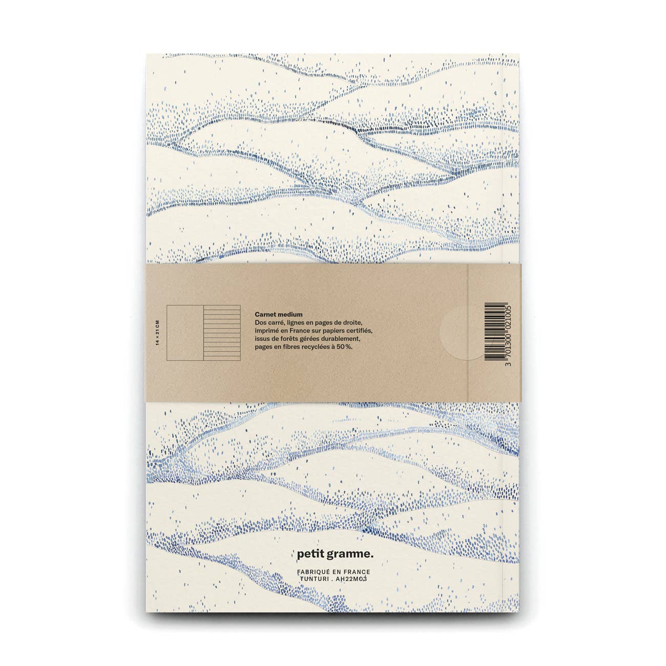 Notebook with wave pattern and Petit Gramme branding on a white background
