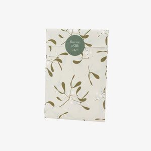 Packaged product with leaf pattern and 'You are a Gift' tag on a white background