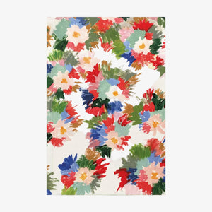 Notebook with colorful floral pattern on a white background
