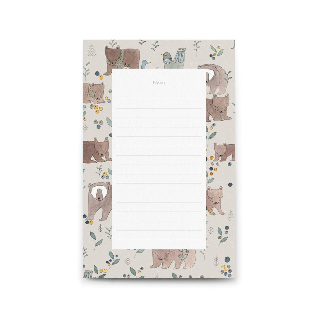 Notepad with bear illustrations on a white background