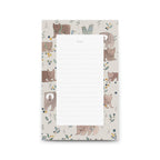 Notepad with bear illustrations on a white background