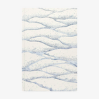 Softcover notebook with wavy blue pattern on a white background