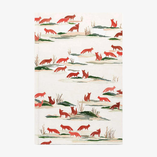Notebook with red fox pattern on a white background