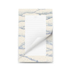 Notepad with a marble design on the cover