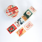 Decorative washi tape with various winter designs on a white background