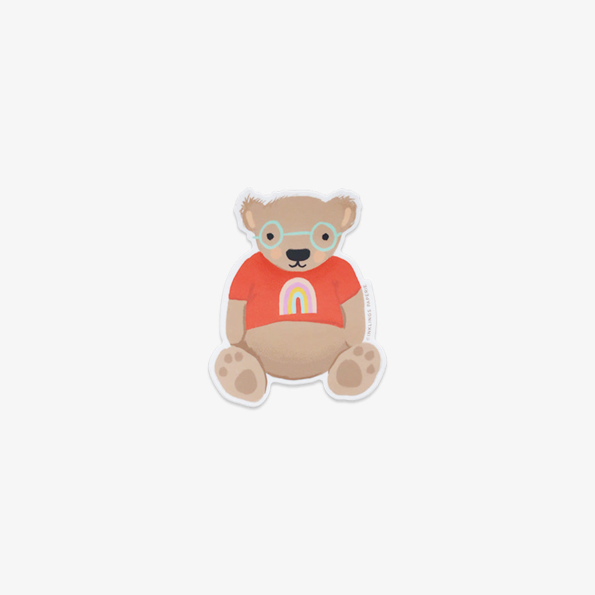 Vinyl sticker of a bear wearing glasses and an orange shirt with a rainbow on a white background