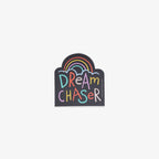 Vinyl sticker with 'Dream Chaser' text and rainbow design on a white background