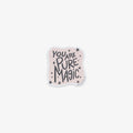 Vinyl sticker with 'You are pure magic' text on a light pink background