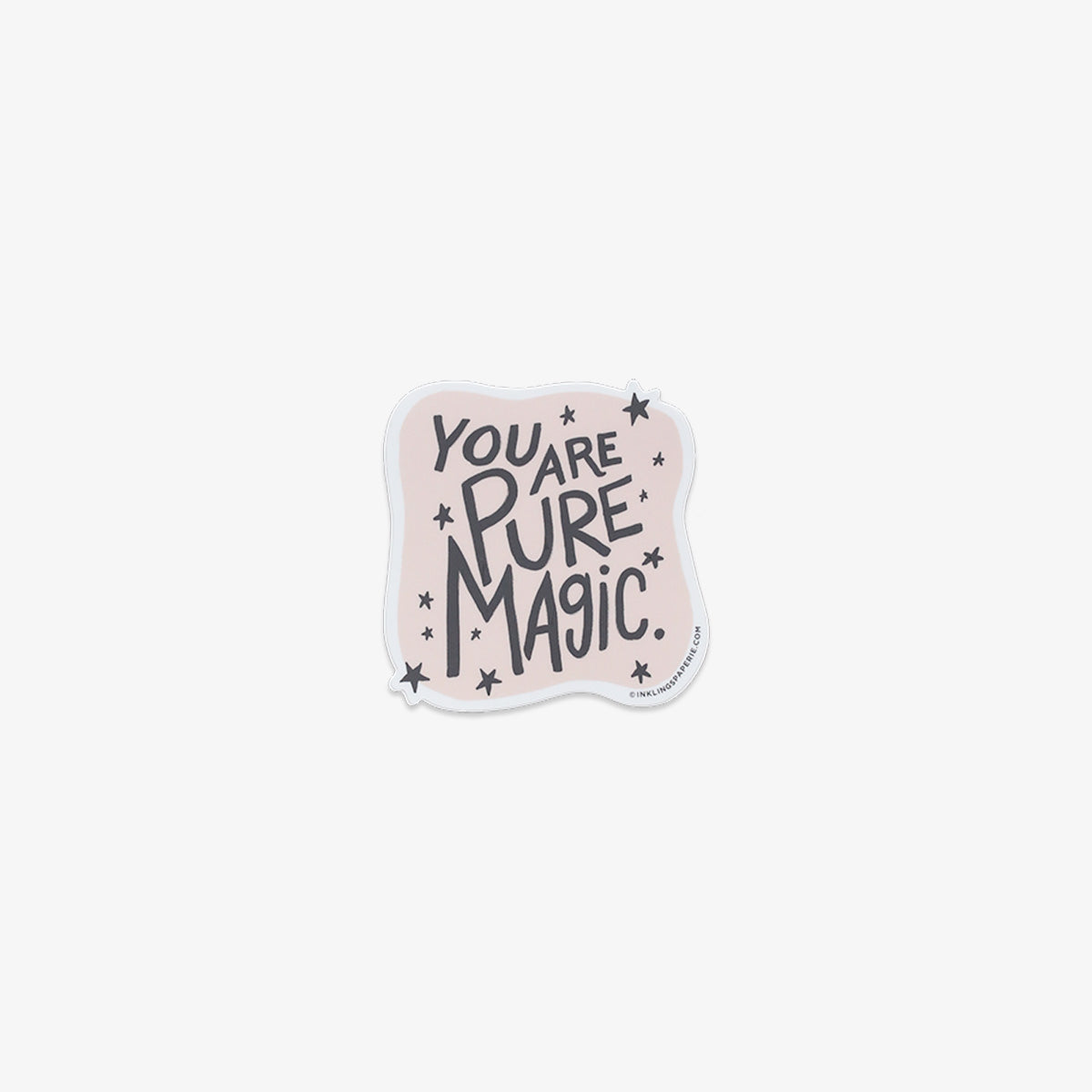 Vinyl sticker with 'You are pure magic' text on a light pink background