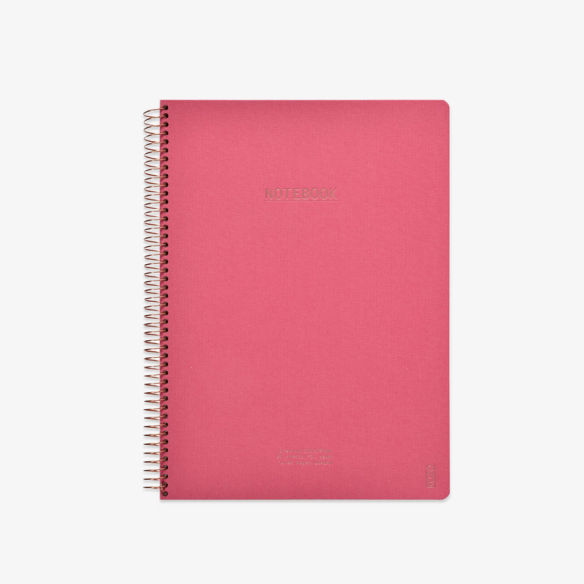 Pink notebook with spiral binding on a white background