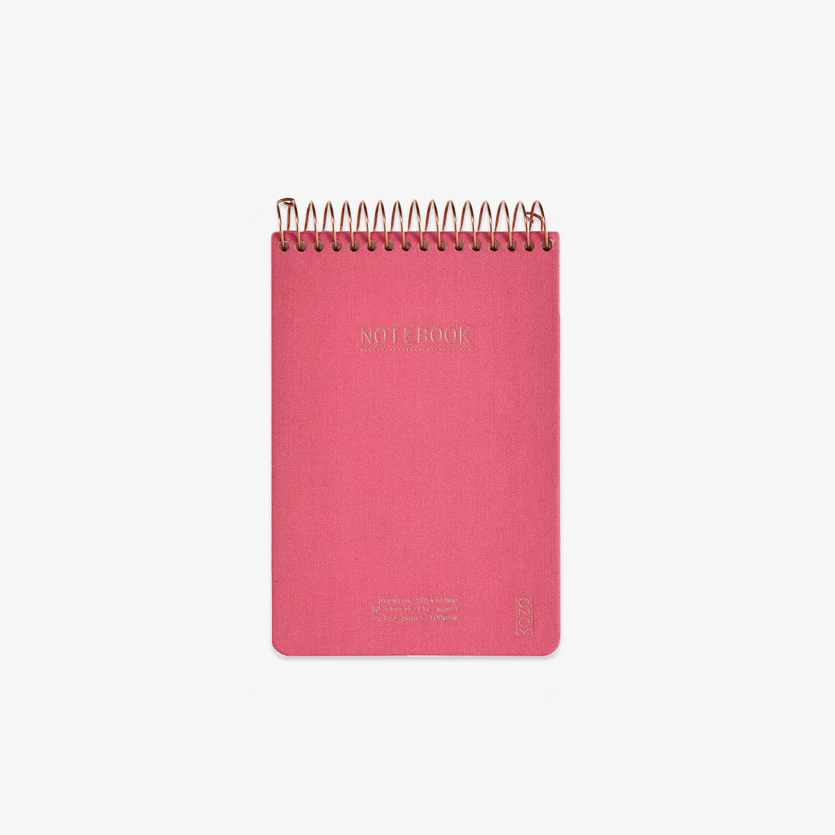 Pink notebook with gold spiral binding on a white background