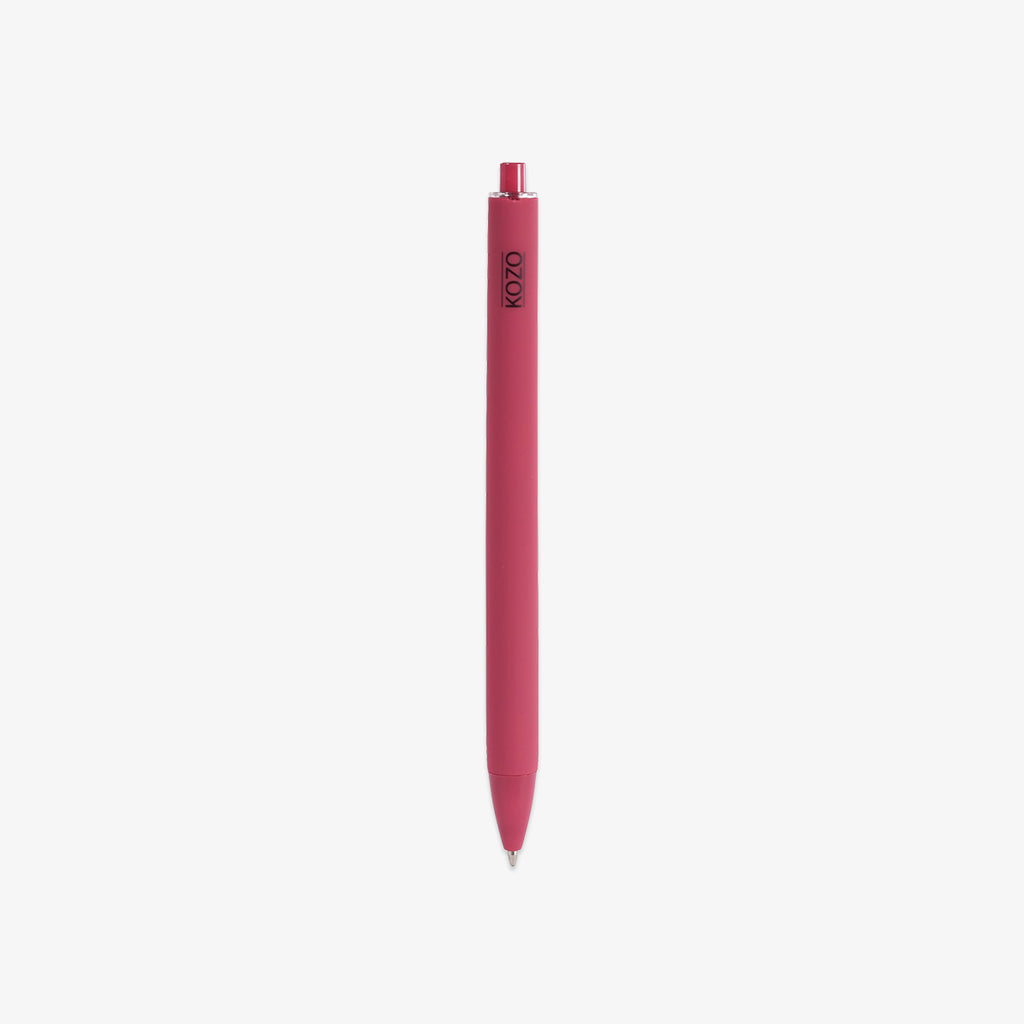 Red BALLPOINT pen with a visible brand logo on a white background