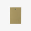 Green notepad with a dark green clover design on a white background