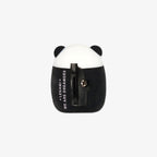 Panda-shaped pencil sharpener with black and white design on a light gray background