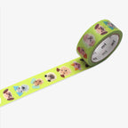 Green washi tape with dog illustrations on a white background