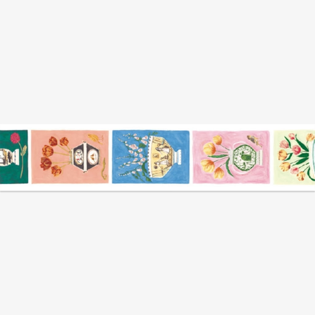 Decorative border strip with floral and teapot designs on a white background