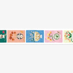 Decorative border strip with floral and teapot designs on a white background