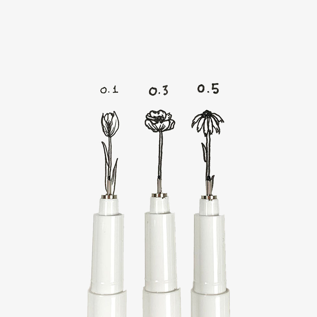 Three pen tips with black ink drawing flowers with different sizes.