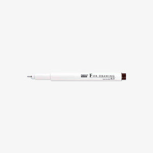 White pen with brown tip on a white background