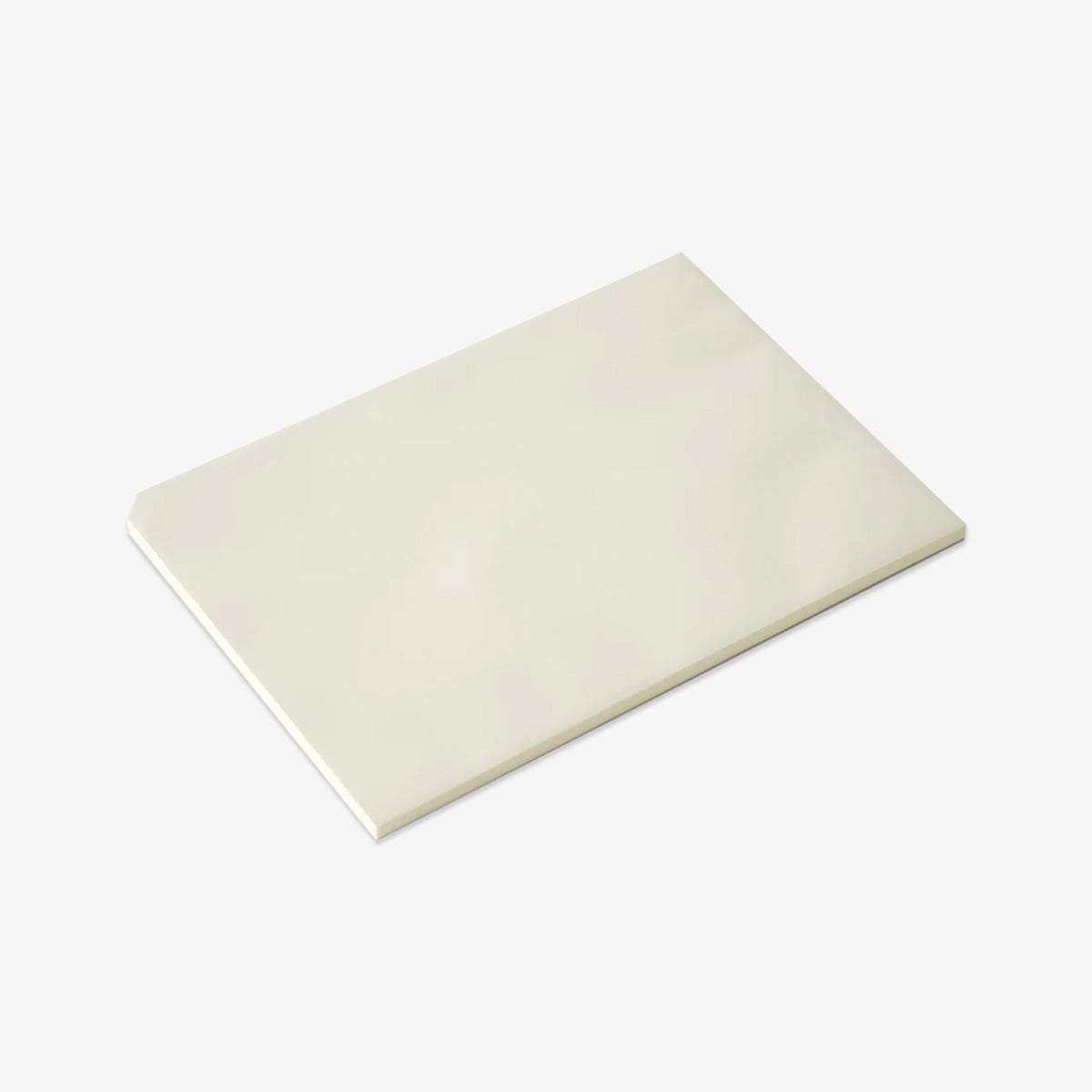 White notepad on a light gray background