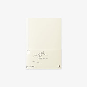 Notebook with minimal design on a light beige background