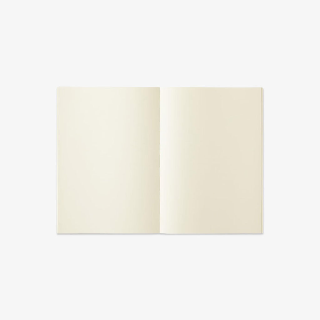 Open notebook with cream-colored pages on a white background