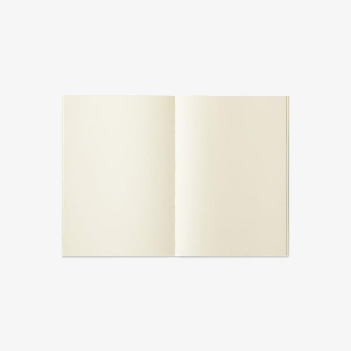 Open notebook with cream-colored pages on a white background