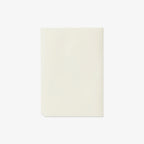 Beige color notepad on a white background