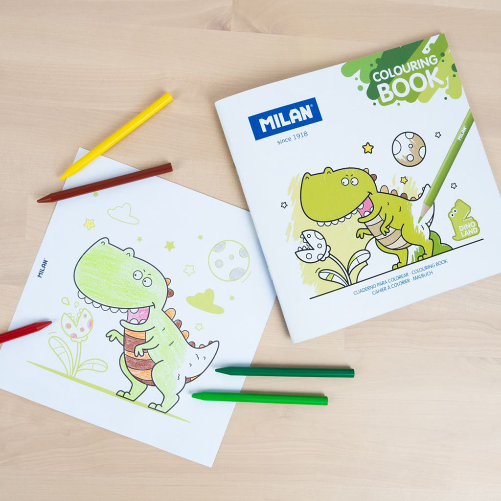 Milan coloring book with dinosaur illustrations and coloring pencils on a wooden surface