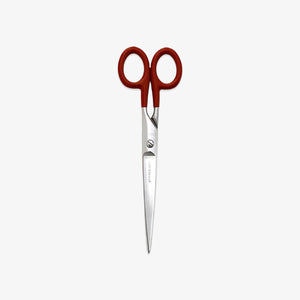 Scissors with red handles on a white background