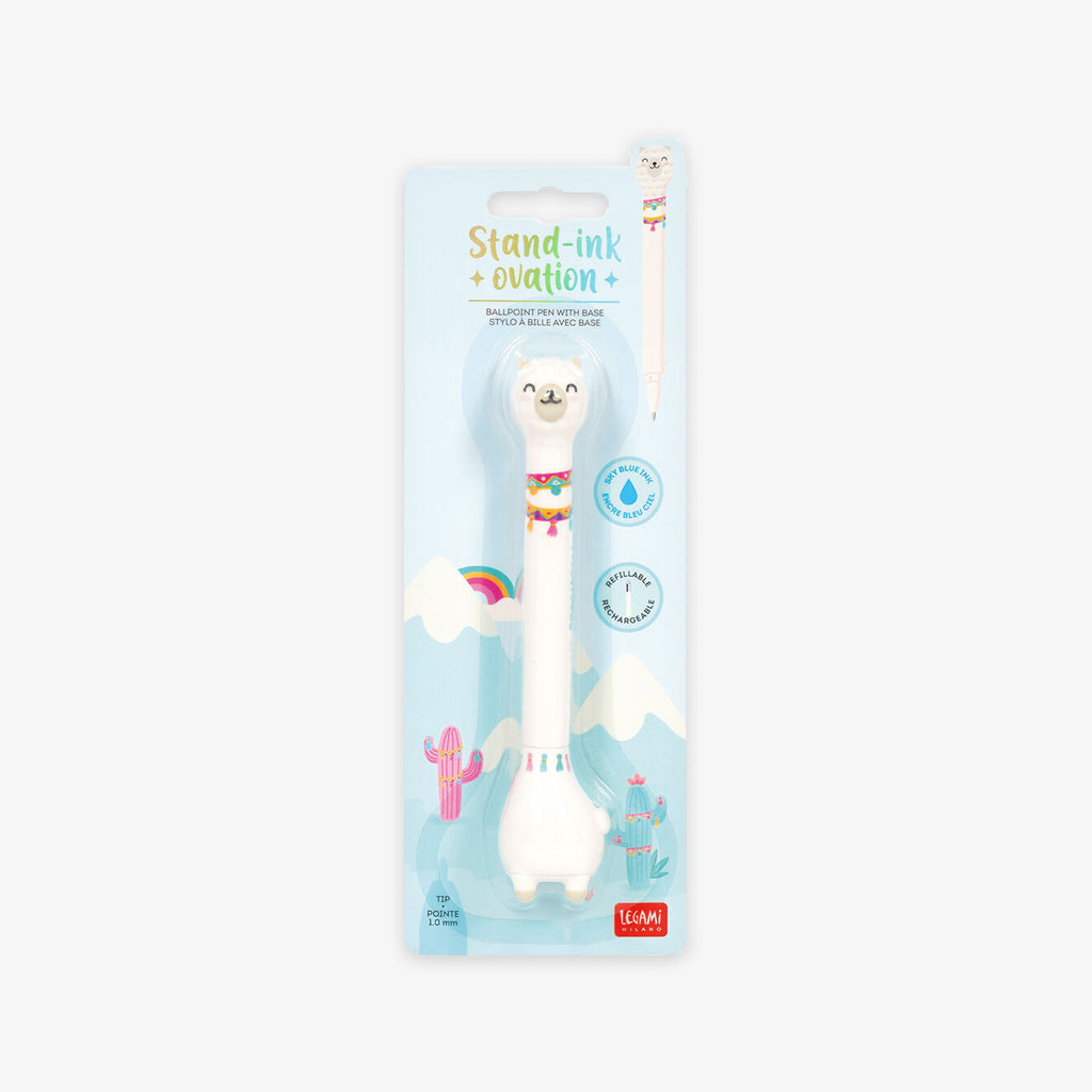 Unicorn-shaped ballpoint pen with base in packaging on a grey background