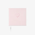 Light pink fabric Notebook with a heart design on a white background