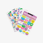 Set of colorful weekly planner stickers on a white background