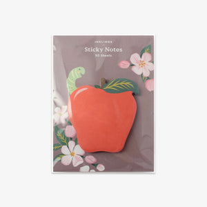 Sticky notes with an apple design on a grey background