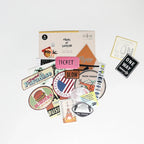 Collection of travel-themed stickers on a white background