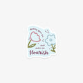 Vinyl sticker with floral design and motivational text on a light blue background