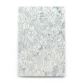 Notebook with a floral line drawing pattern on a white background