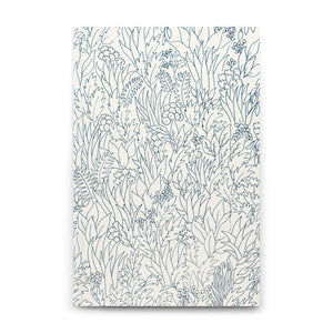 Notebook with a floral line drawing pattern on a white background