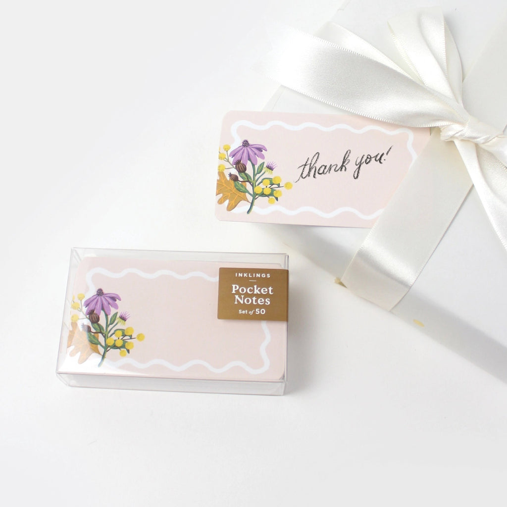 Box of pocket notes with floral design and 'thank you' text on a white background